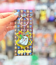Load image into Gallery viewer, Hp Owl Spinning Metal Keychain

