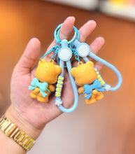 Load image into Gallery viewer, Butter Bear Donut Premium Keychain / Bag Charm
