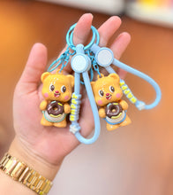 Load image into Gallery viewer, Butter Bear Donut Premium Keychain / Bag Charm
